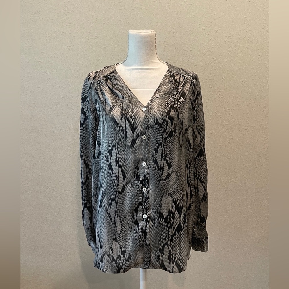 New, jaye.e. Women long sleeve button down animal print blouse.